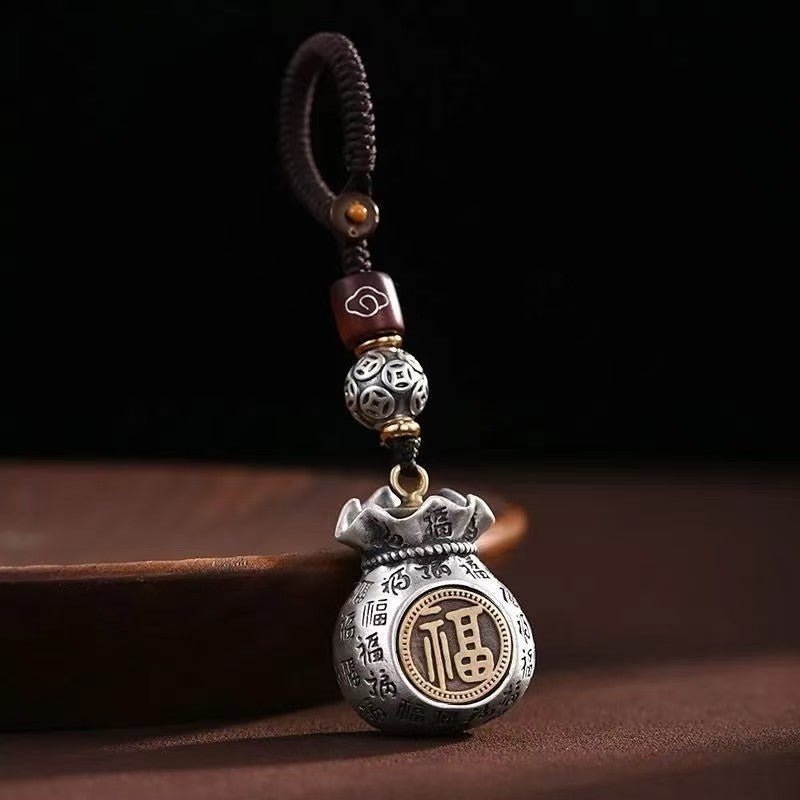 Tao Stones Infinite Abundance: Rotating Fortune Bag Wealth & Blessing Keychain