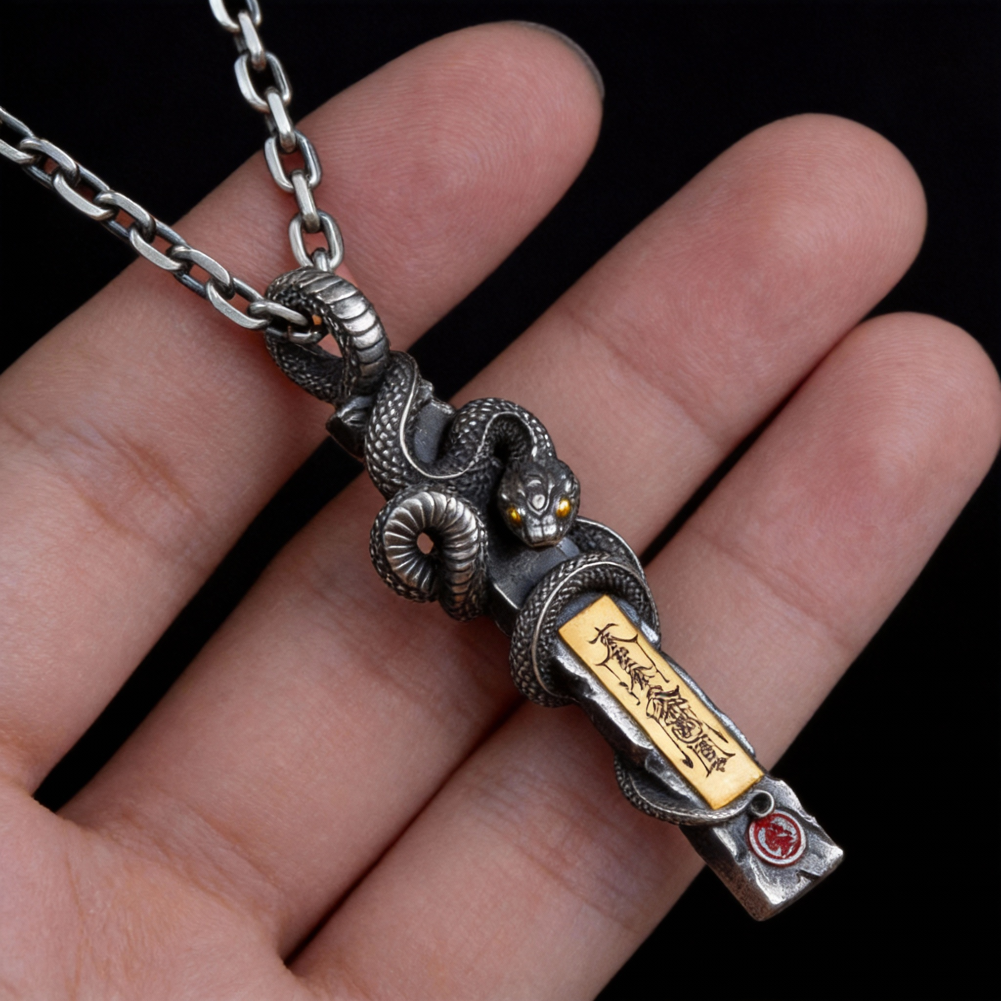 Tao Stones Serpent Guardian Pendant featuring a detailed handcrafted snake design in premium sterling silver, symbolizing protection and transformation.