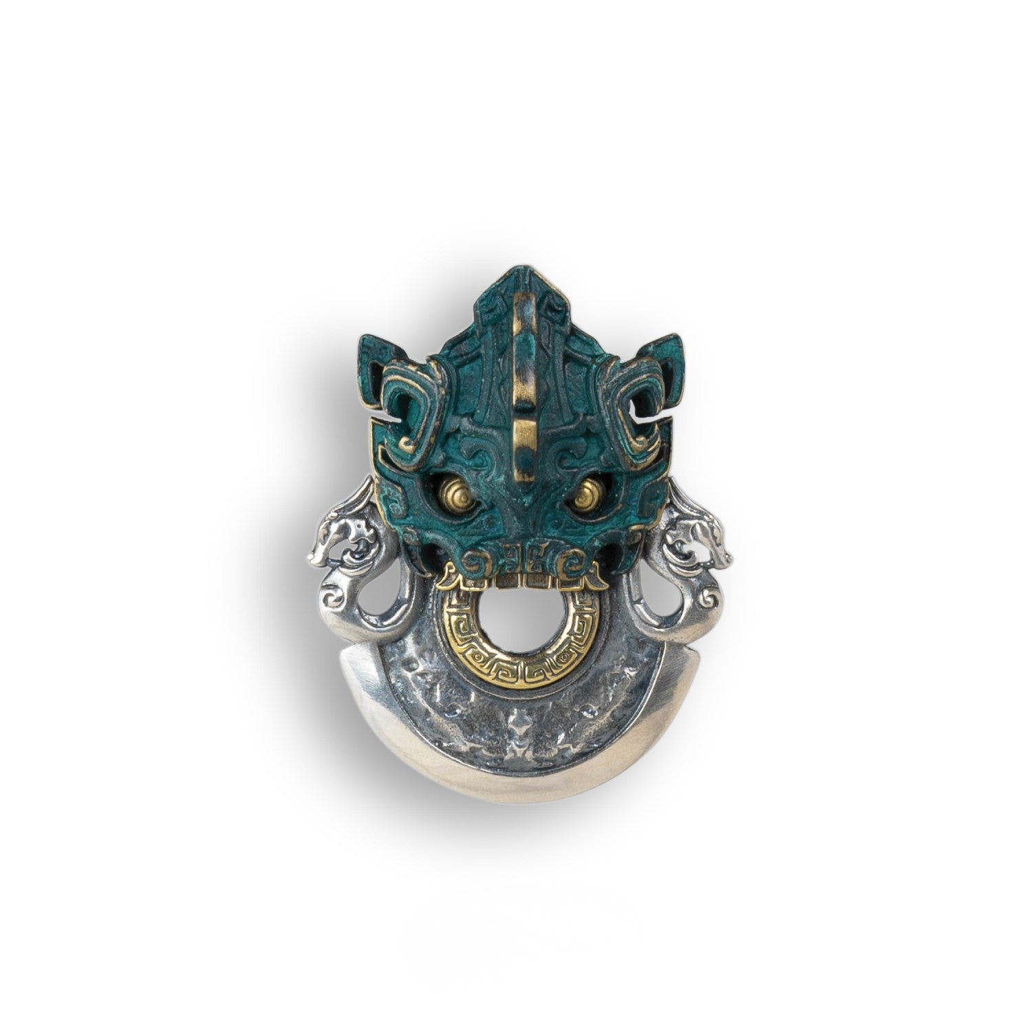 Front view of the Ancient Bronze Taotie Battle Axe Pendant featuring a green patina mask and silver blade.